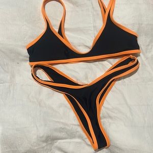 orange and black swim suit